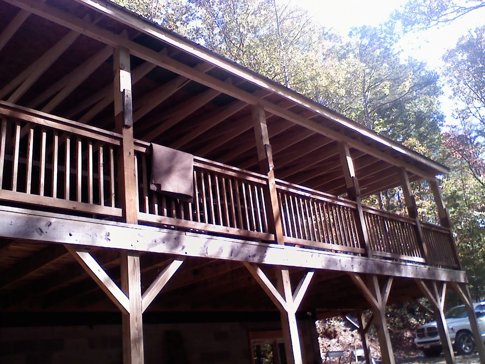 Timber framing under a new elevated porch and deck — Roof Leak Repair in Erhard by Roofing Brothers